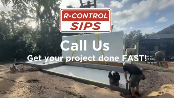 Crew setting R-Control SIP walls on a slab