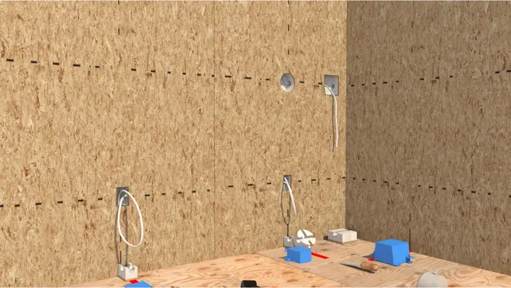 Interior of a room framed with R-Control SIPs, with electrical boxes installed in the panel walls
